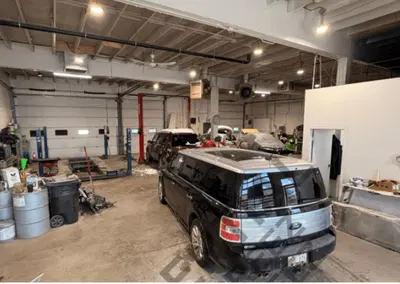 Thriving Automotive Shop with Upgraded Facilities and Unused Capacity