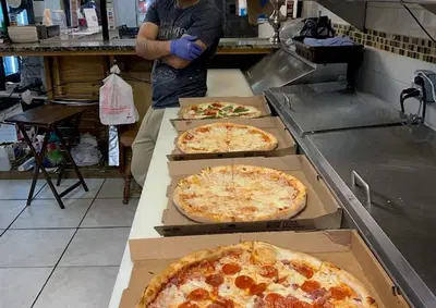 Profitable Pizza Restaurant with Built In Rental Income