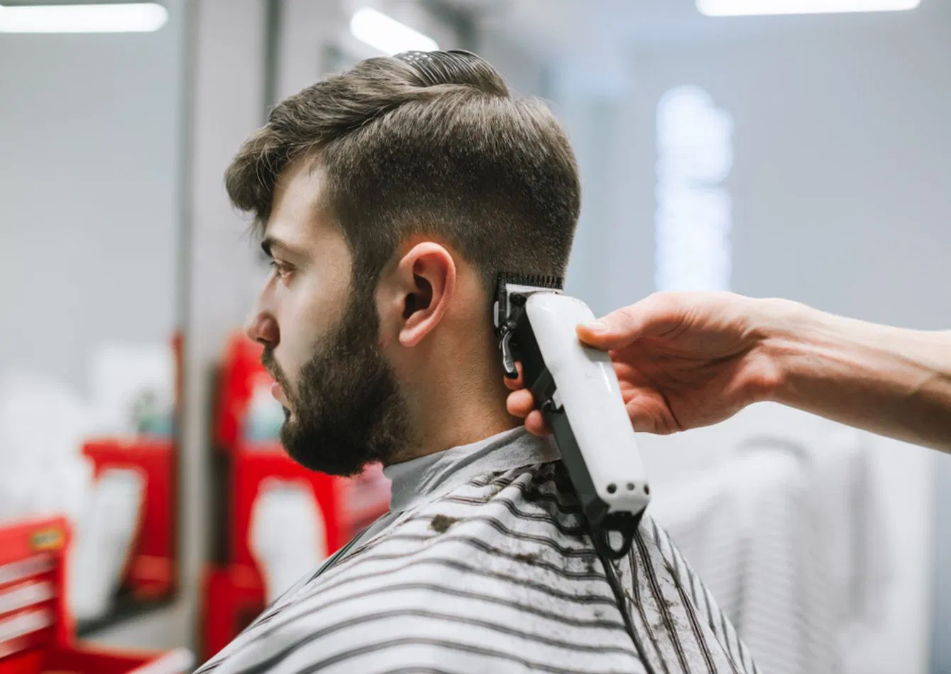 Premier Men's Salon with Loyal Clientele in Affluent Market