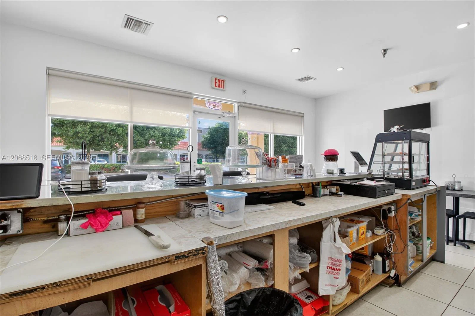 Profitable Cafe and Auto Repair Shop with Dual Revenue Streams