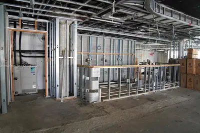 Premier Waterfront Commercial Condo with Panoramic Bay Views