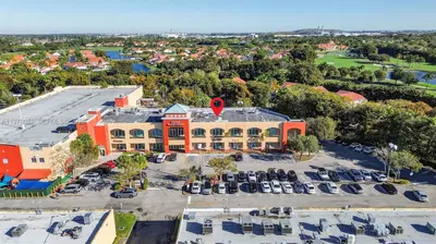 Turnkey Beauty Studio with Individual Suites for Rental Income