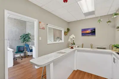 Turnkey Beauty Studio with Individual Suites for Rental Income