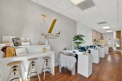 Turnkey Beauty Studio with Individual Suites for Rental Income