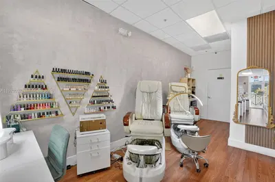 Turnkey Beauty Studio with Individual Suites for Rental Income