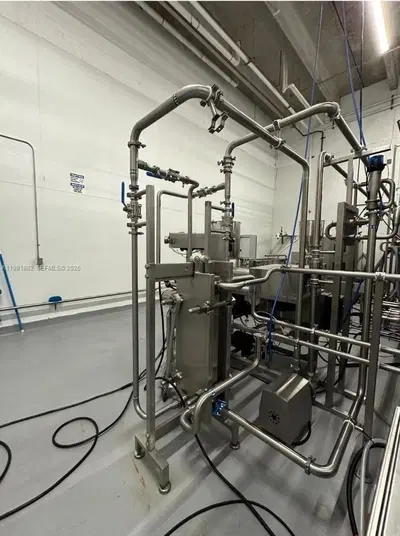 Complete Food Manufacturing Facility with Modern Stainless Steel Equipment