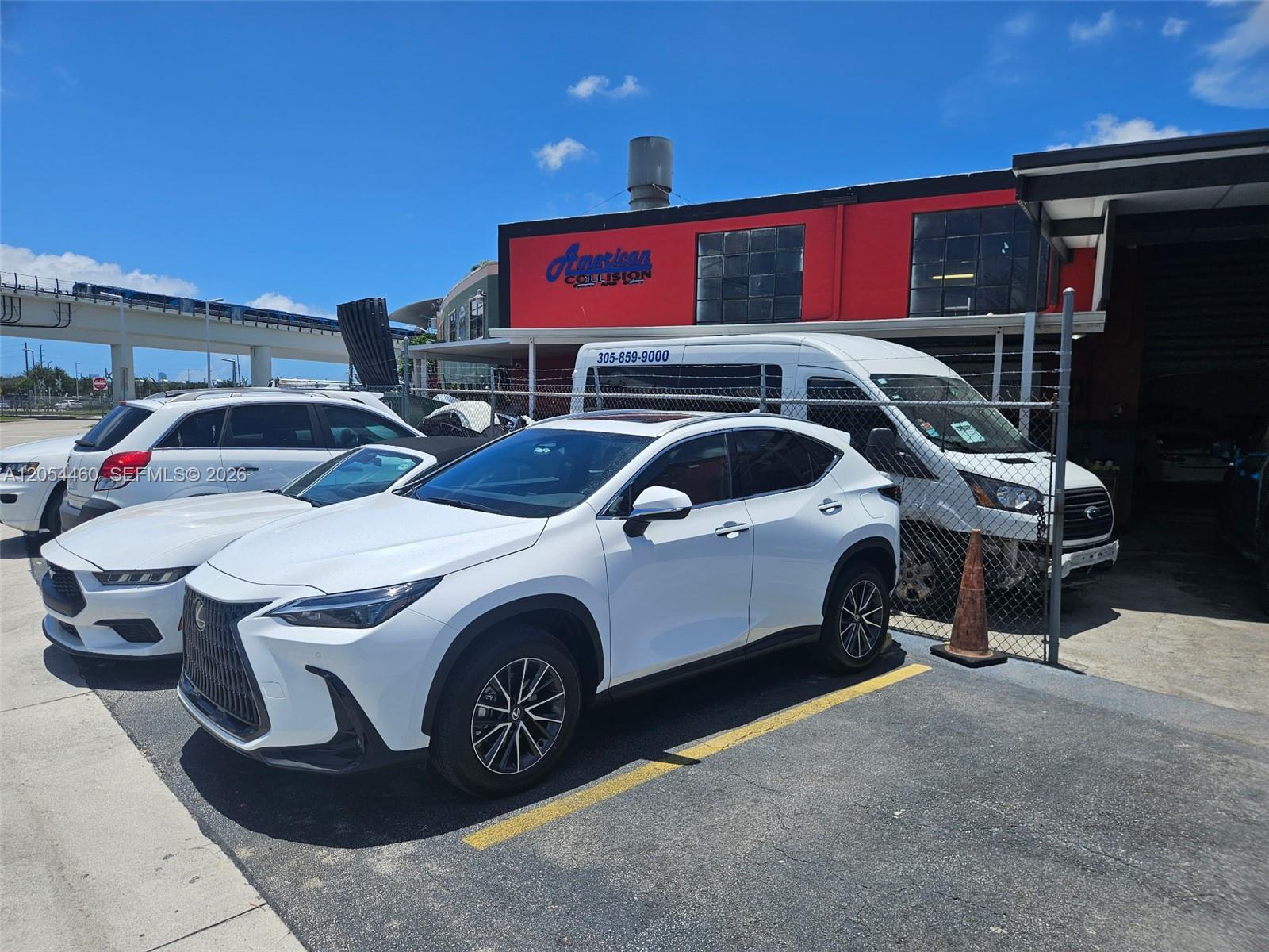 Profitable Auto Body Shop with Two Professional Spray Booths
